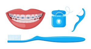  矯正中の歯とデンタル用品のイラスト 