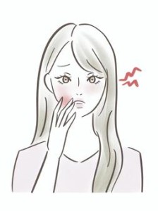 口内炎に苦しむ女性